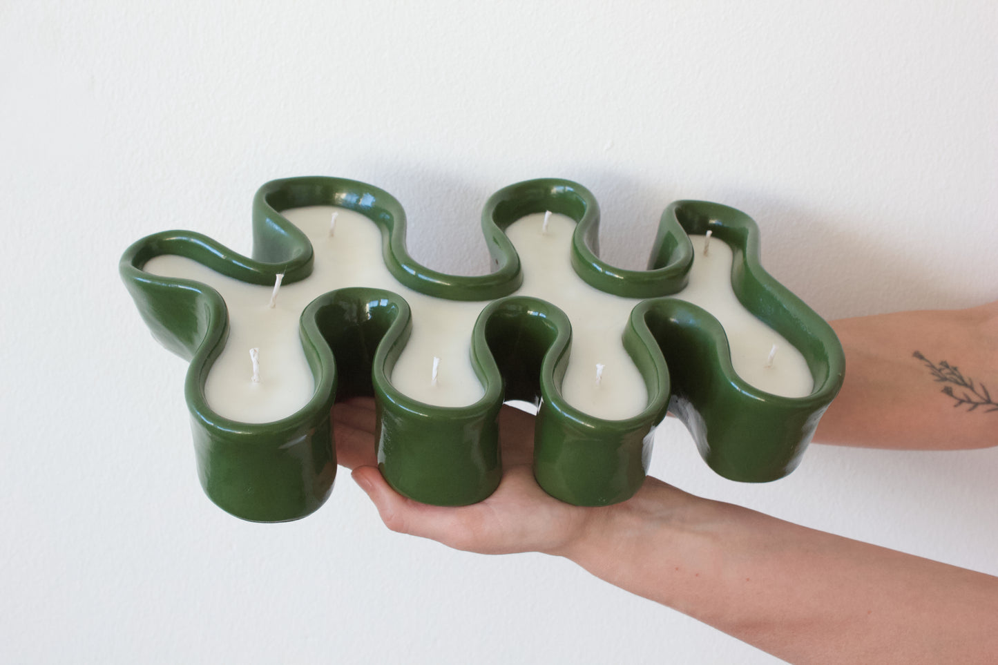 Forest green meander candle